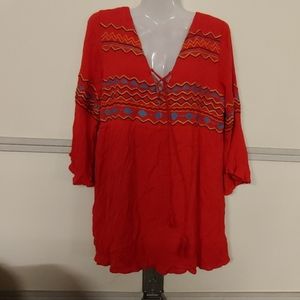 Flowing embroidered vneck shirt with tie in front